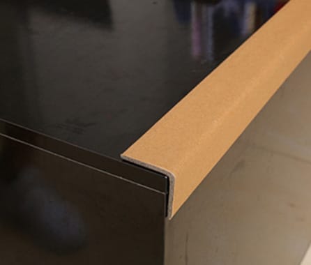 What is a paper corner? Paper corner protector, also known as edge board, is one of the most popular packaging products around the world, used to replace wood packaging and other bulky packaging methods. It has the characteristics of low price, light weight, firmness, and environmental protection requirements. Also known as angle paper and paper angle steel, it is made of yarn tube paper and cattle card paper by a set of angle protection machine, and is perpendicular to each other. It can replace 100% of wood for recycling and reuse. It is an ideal new green packaging material.